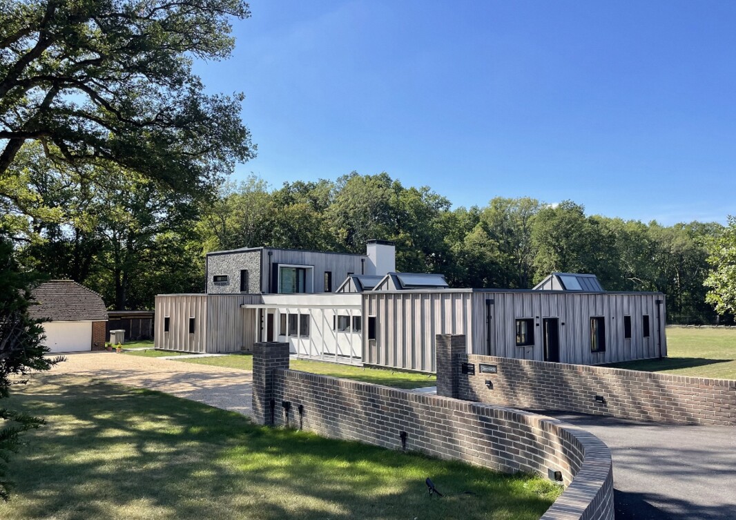 028 Ewhurst Surrey Hill Sophie Bates Architects front W.jpg